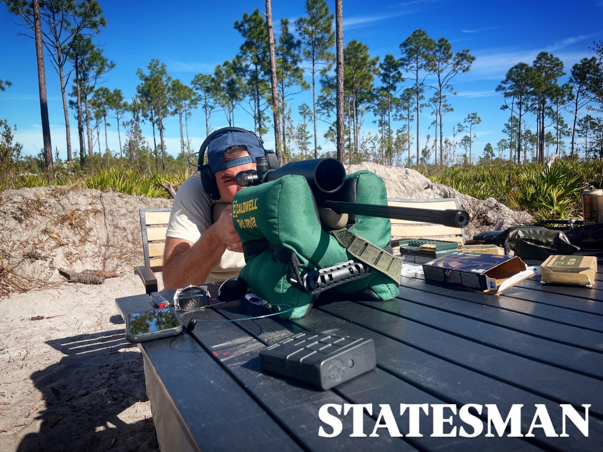 Member sighting in a precision rifle at the Statesman's Ranch bench